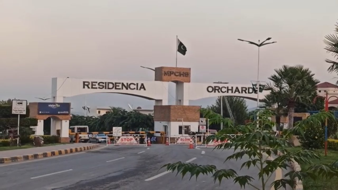 Residencia Orchards Outside Gate View