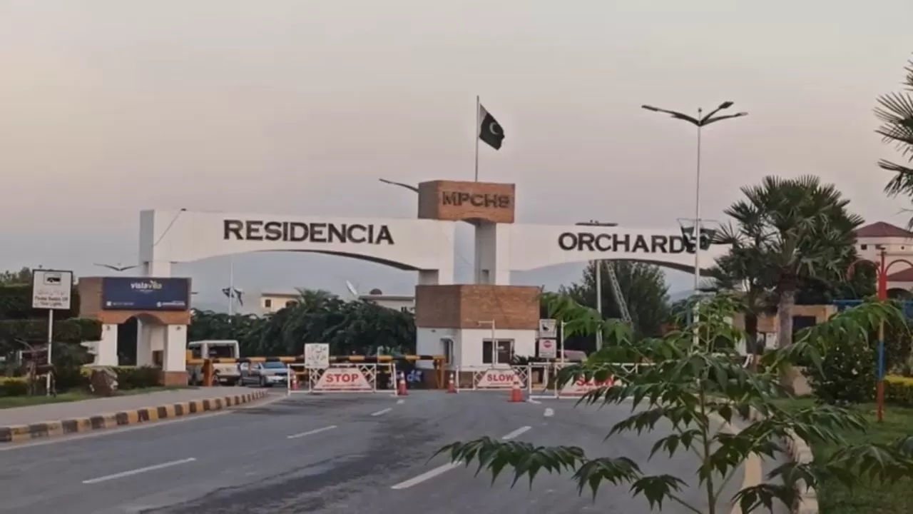Residencia Orchards Outside Gate View